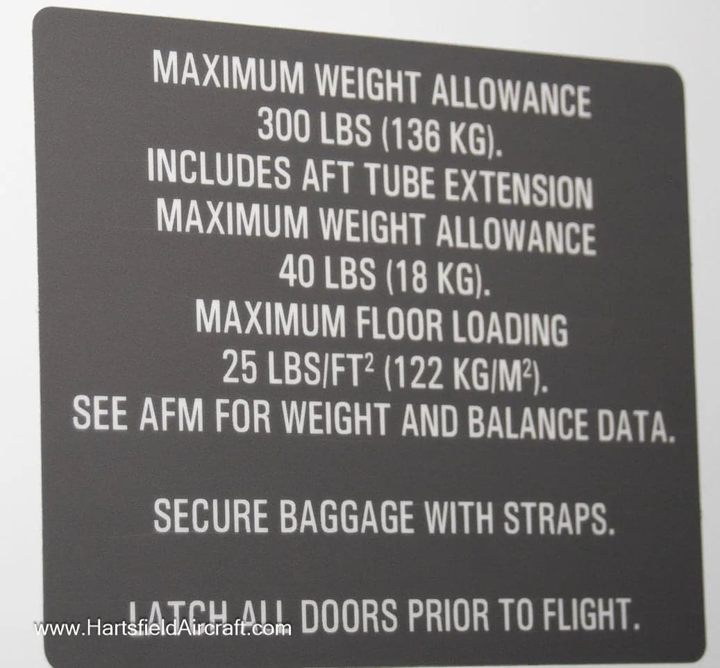 A placard showing the maximum weight allowance for the aircraft.