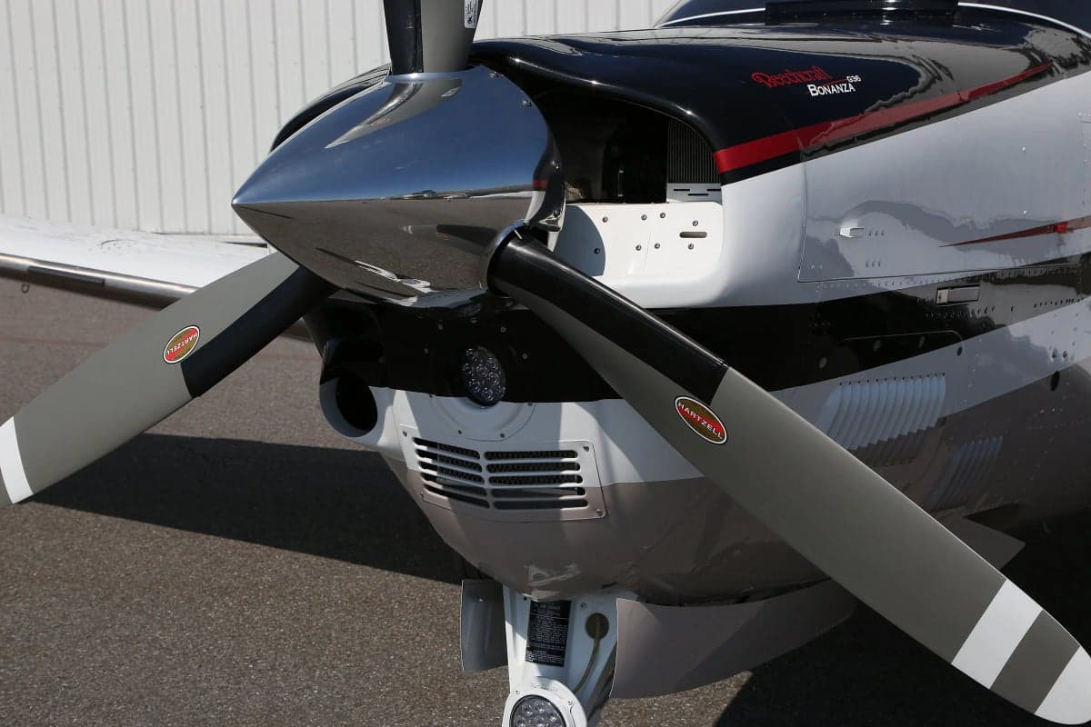 Close-up of the propeller and front cowling of a Beechcraft Bonanza G36.