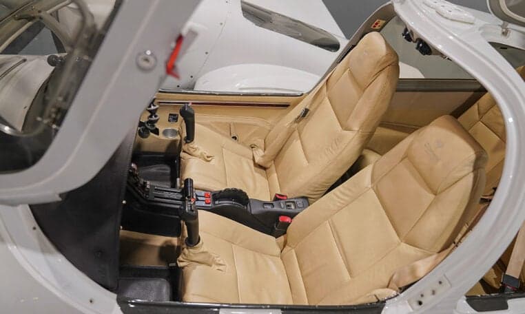 Interior view of the Diamond DA62 aircraft showing the seats and controls.