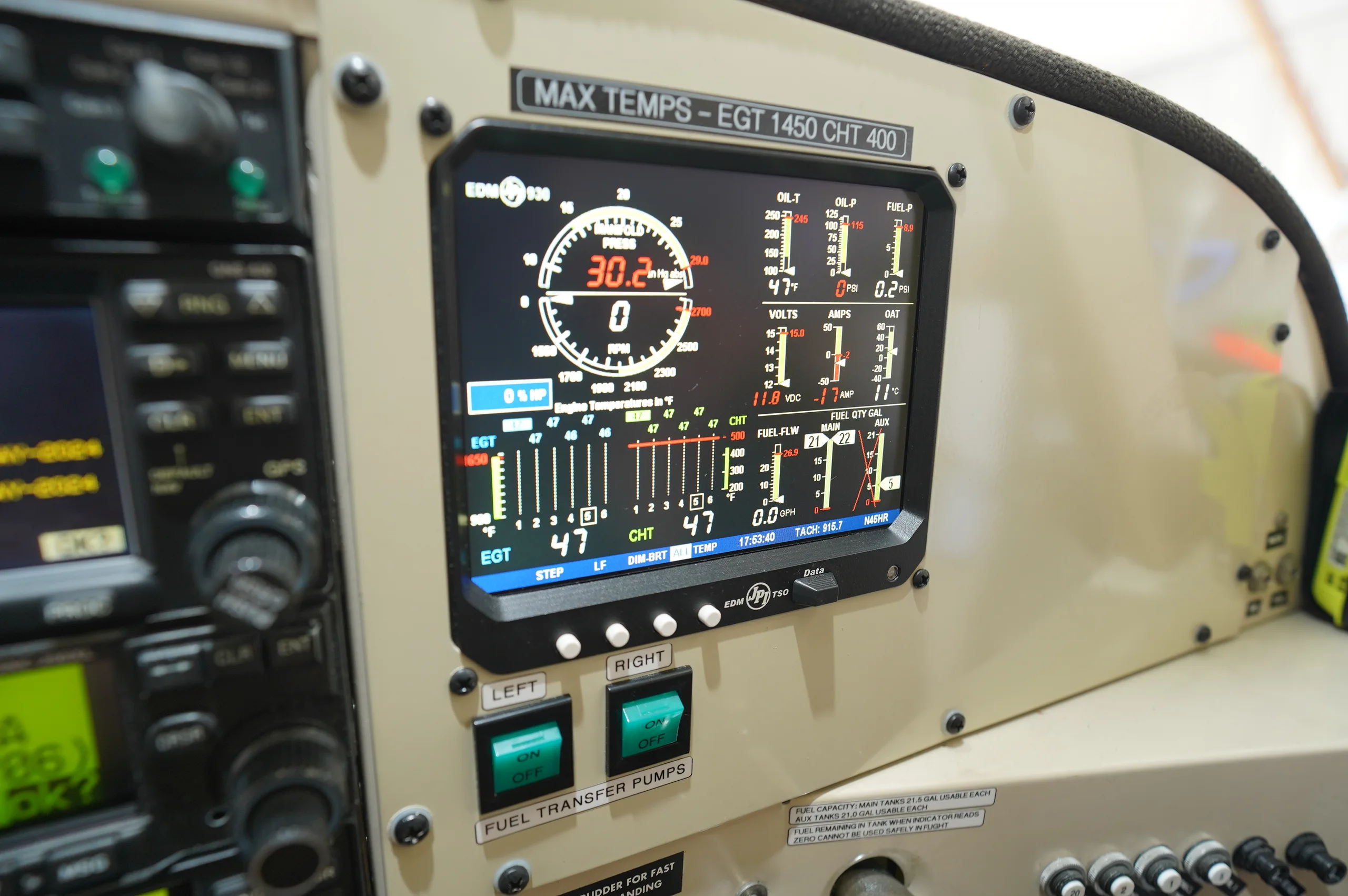 Close-up of a digital engine monitoring display on the aircraft's instrument panel.