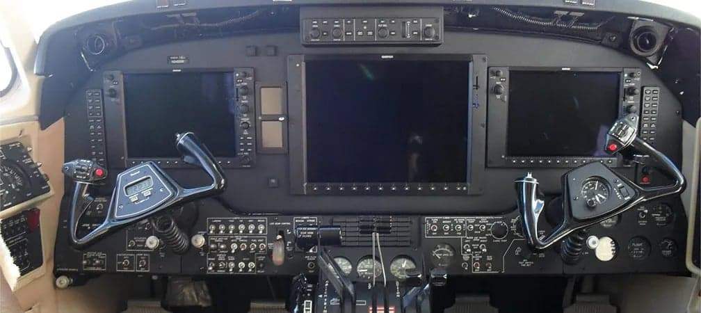 King Air cockpit instrument panel with modern avionics.