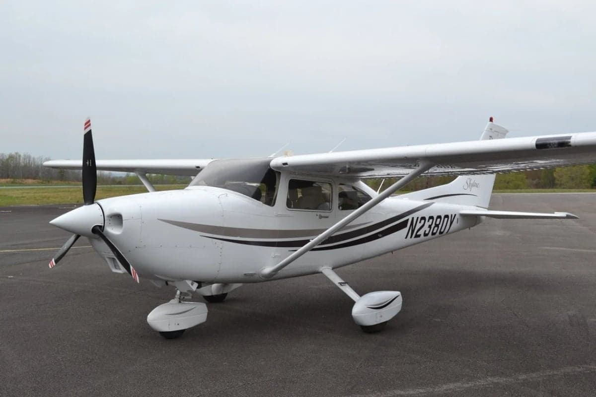 A Cessna Skylane N2380Y is parked on the tarmac.