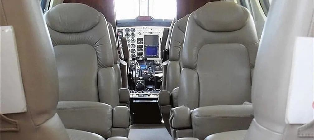 View of the cockpit from the cabin seats.