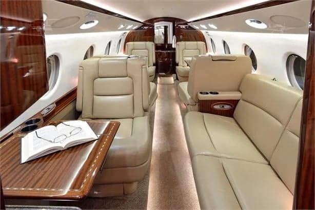 A view of the aircraft's interior, showcasing the seating arrangement and cabin design.