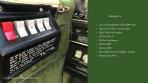 Close up of the avionics and switches in the cockpit of the Piper Lance II aircraft.