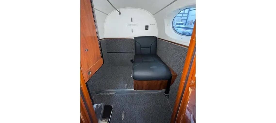 View of the aircraft interior showing the cabin seats.