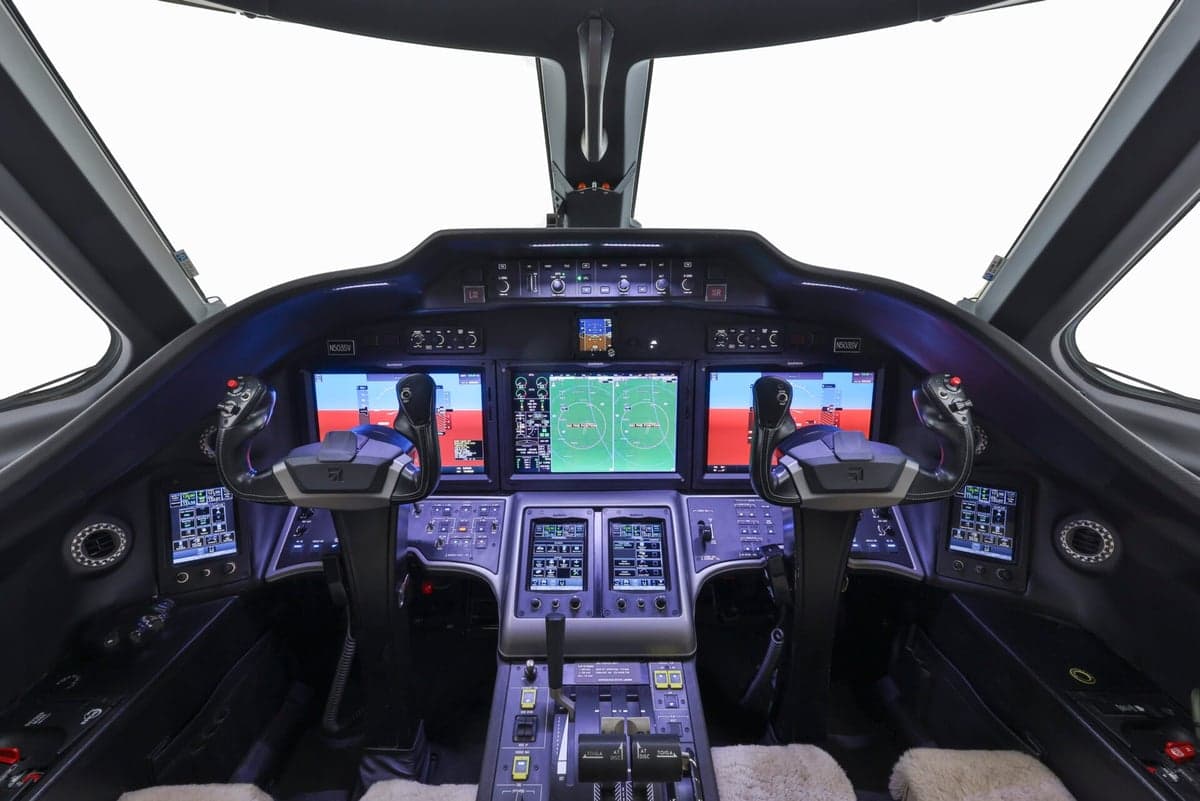 Close up of the wing and engine of a Cessna Citation Latitude.