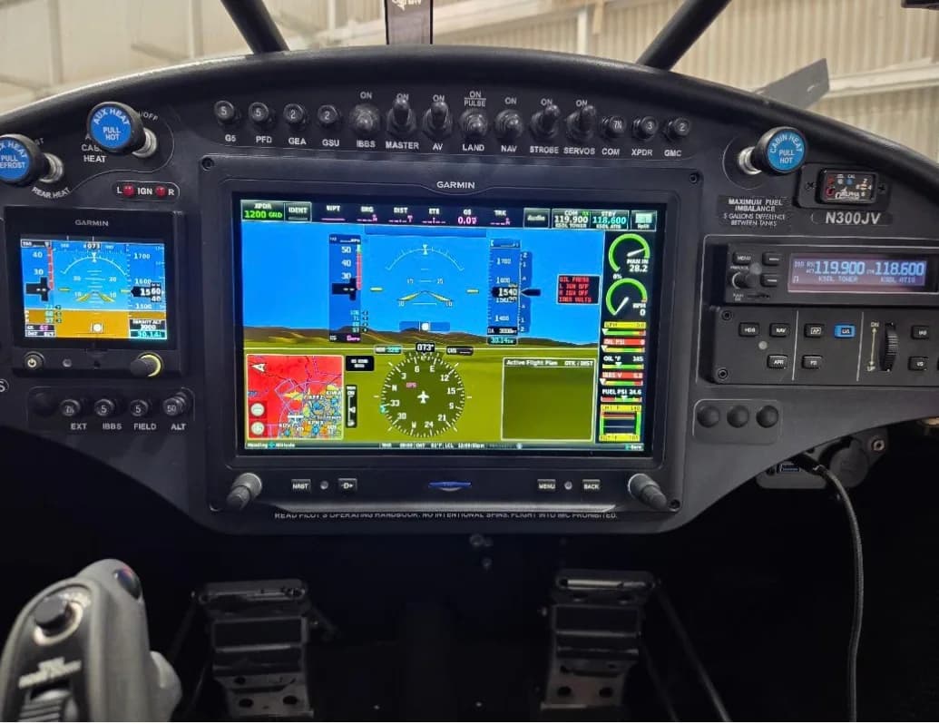 Detailed view of the Carbon Cub aircraft's glass cockpit instrument panel.