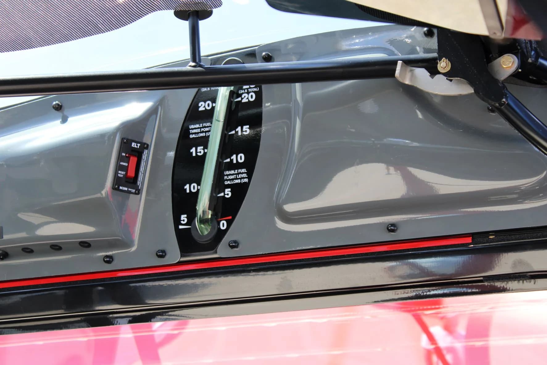Close-up of the fuel gauge in the cockpit of the NX Cub aircraft.