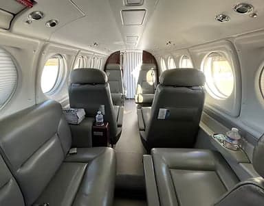 The interior of the aircraft, showing the seating arrangement and cabin features.