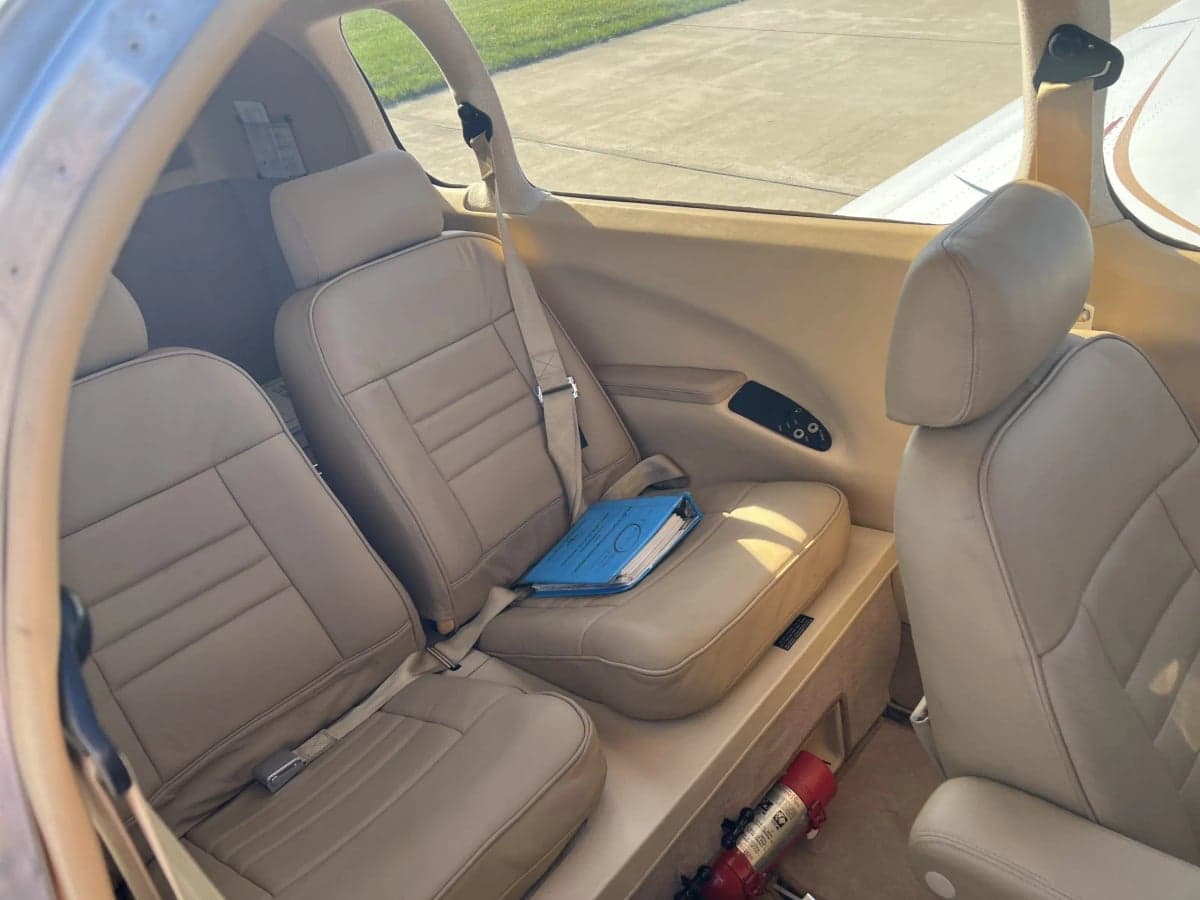 View of the aircraft's tan leather seats and interior.