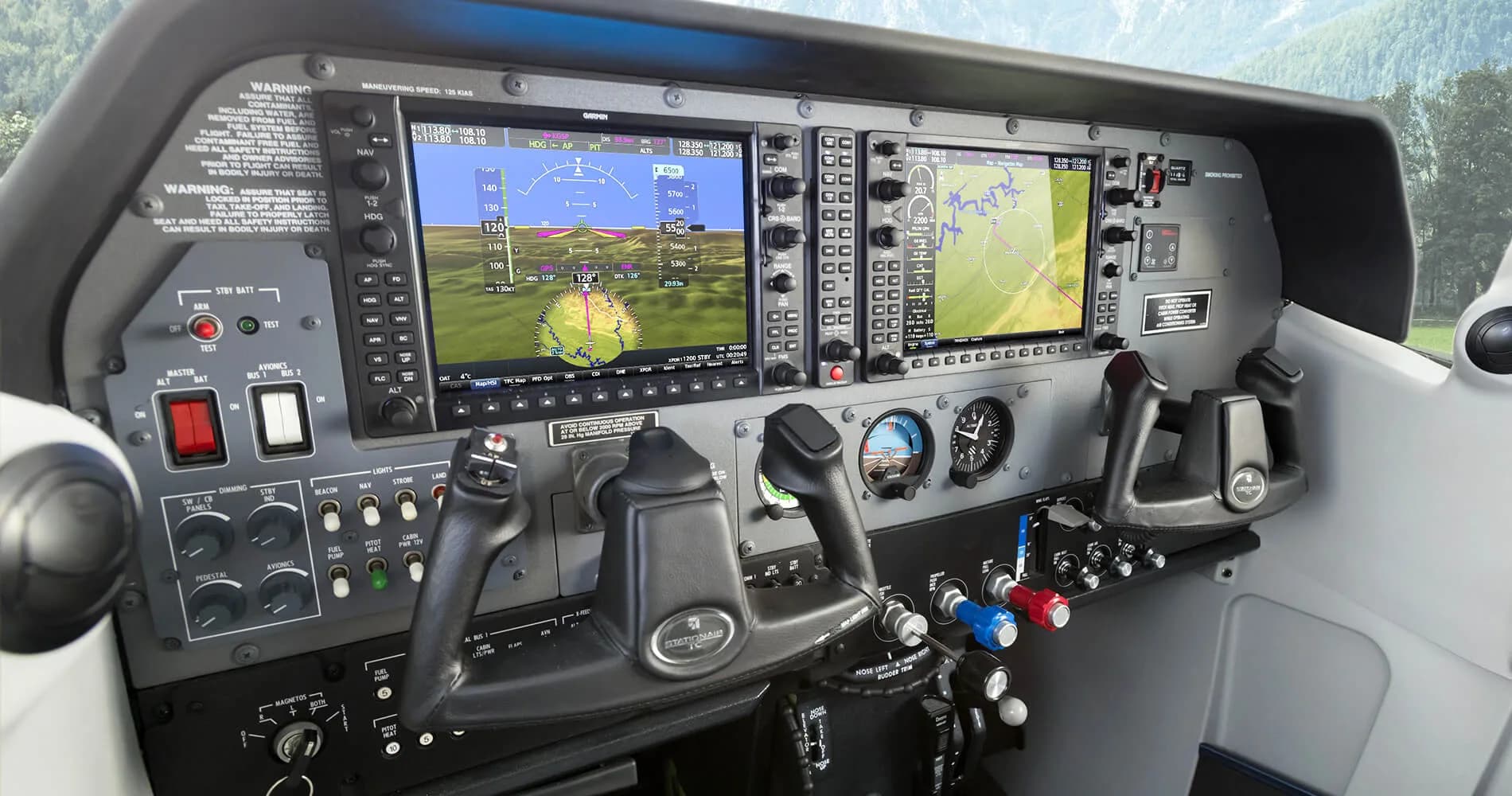 The cockpit of a Cessna Stationair with a modern glass panel.