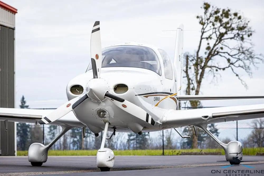 Close up front view of Cirrus SR22T aircraft N282CD on the tarmac.