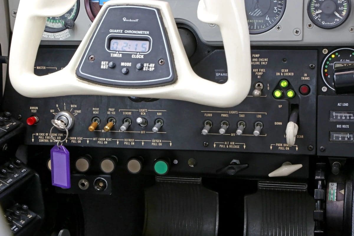 Close-up of the aircraft's control panel and switches.