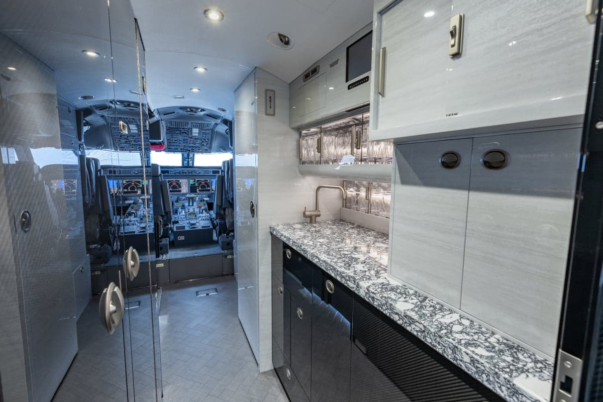 View of the aircraft galley and cockpit.