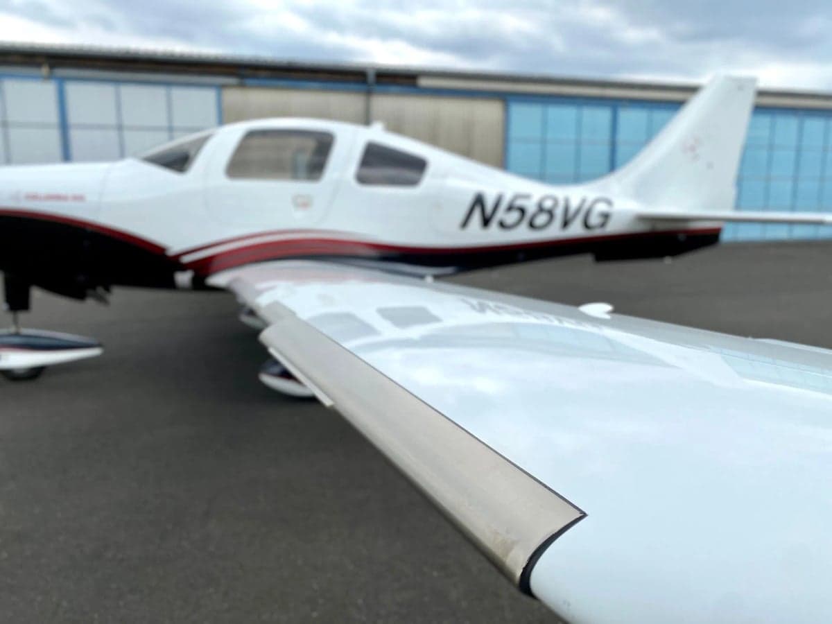 Close up of the wing and tail of Columbia 400 aircraft N58VG.