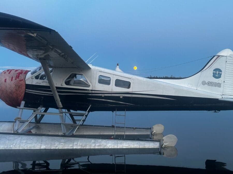 A de Havilland Beaver floatplane is shown in profile.