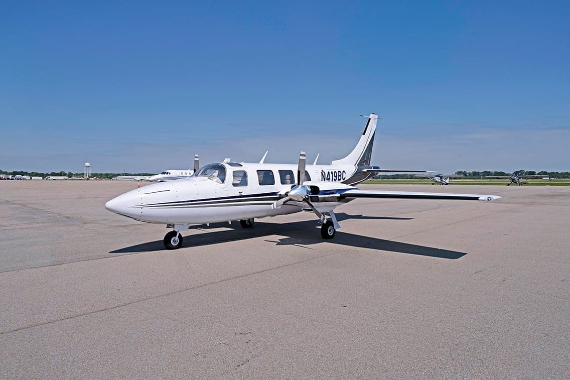 Aerostar aircraft N419BC parked on the tarmac with a white and gray paint scheme.