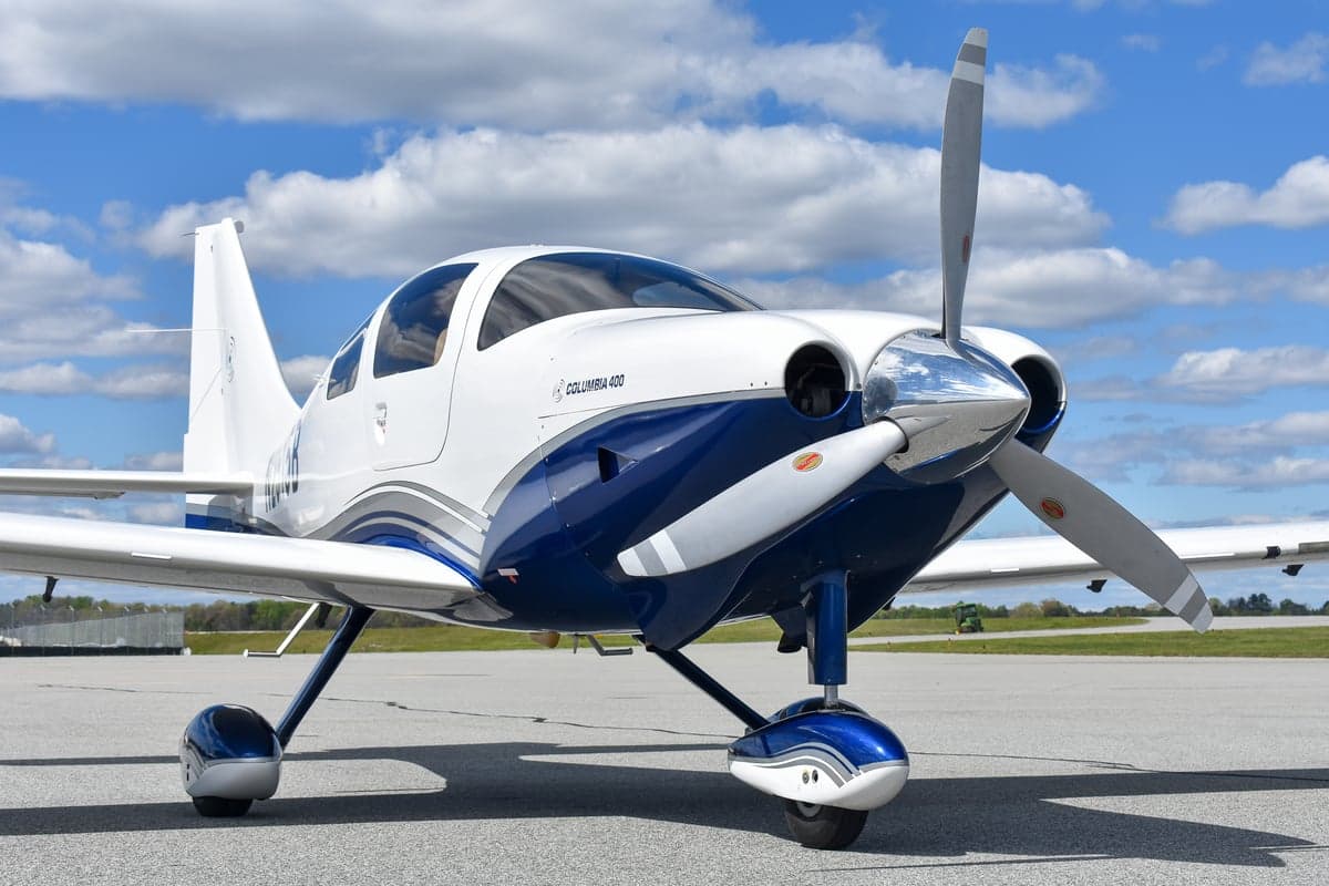 Columbia 400 aircraft N2515B on the ramp, side view.