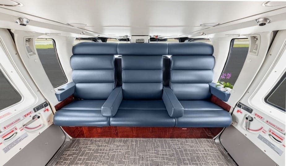 View of the interior cabin with blue leather seats.