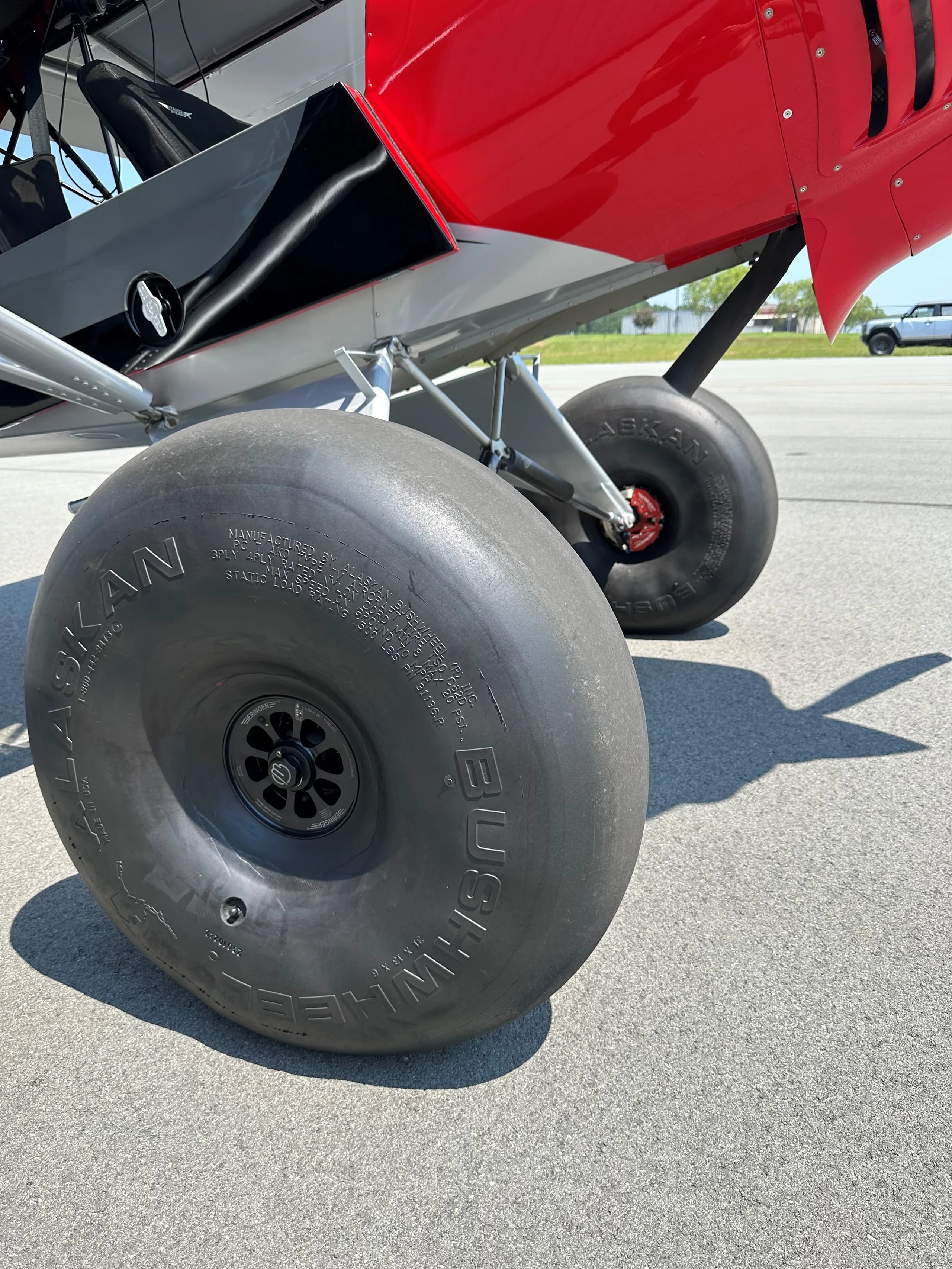 Close up of the large tundra tires on the Carbon Cub FX-3.