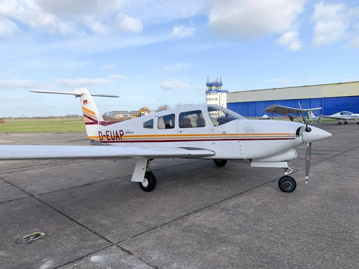 D-EUAP Piper Arrow II on the ground at an airport.