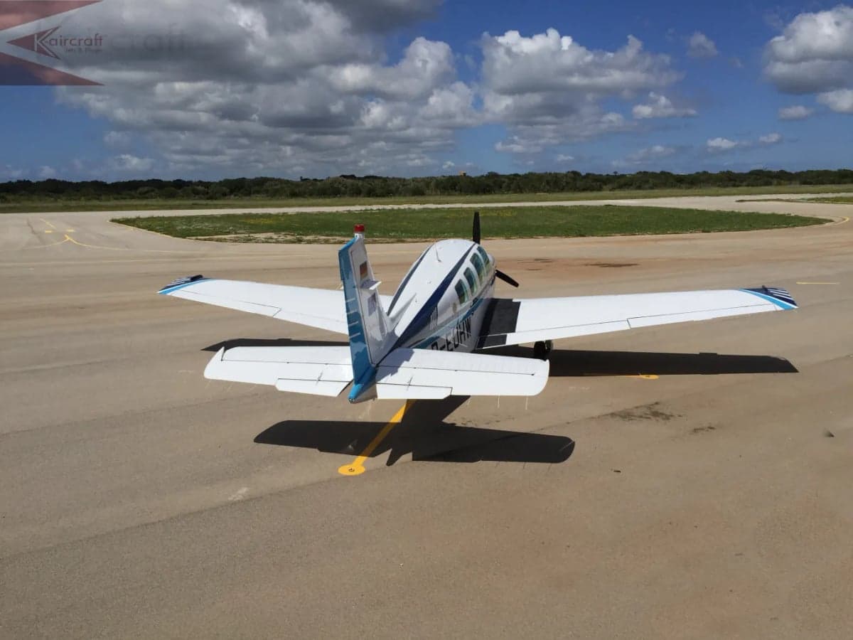 Rear view of the D-EUHW aircraft on the tarmac.
