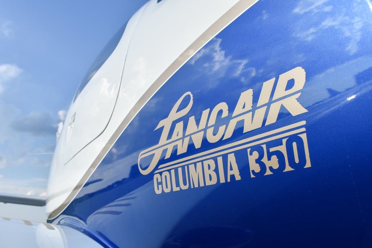 Lancair Columbia 350 aircraft with gull-wing doors open.