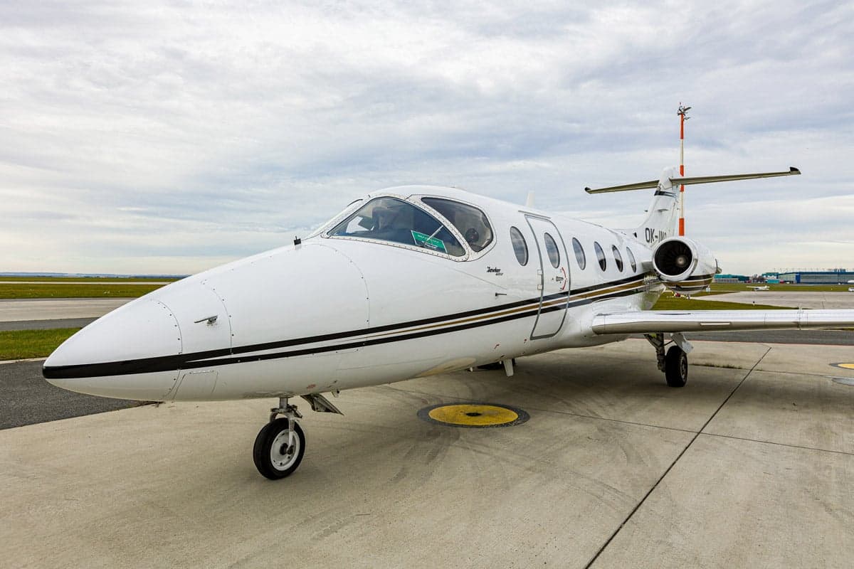 Close up of the Beechjet 400A aircraft with registration OK-IMO on the tarmac.