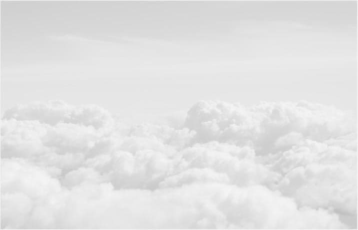 A view of fluffy clouds from above.