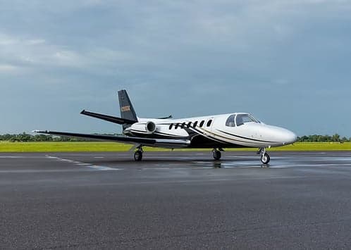 A Cessna Citation CJ4 business jet on the tarmac.