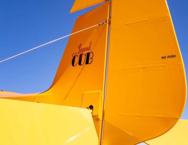 A close-up of the yellow Legend Cub's tail, showing the "Legend CUB" logo and "NO PUSH" text.
