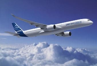 A white Airbus A350 flying above the clouds.