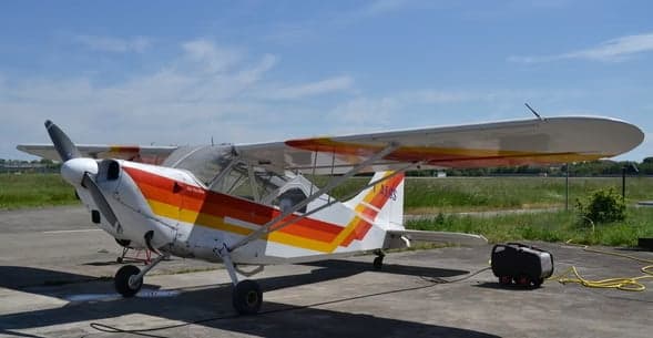 I-AEGS aircraft in a hangar, side view.