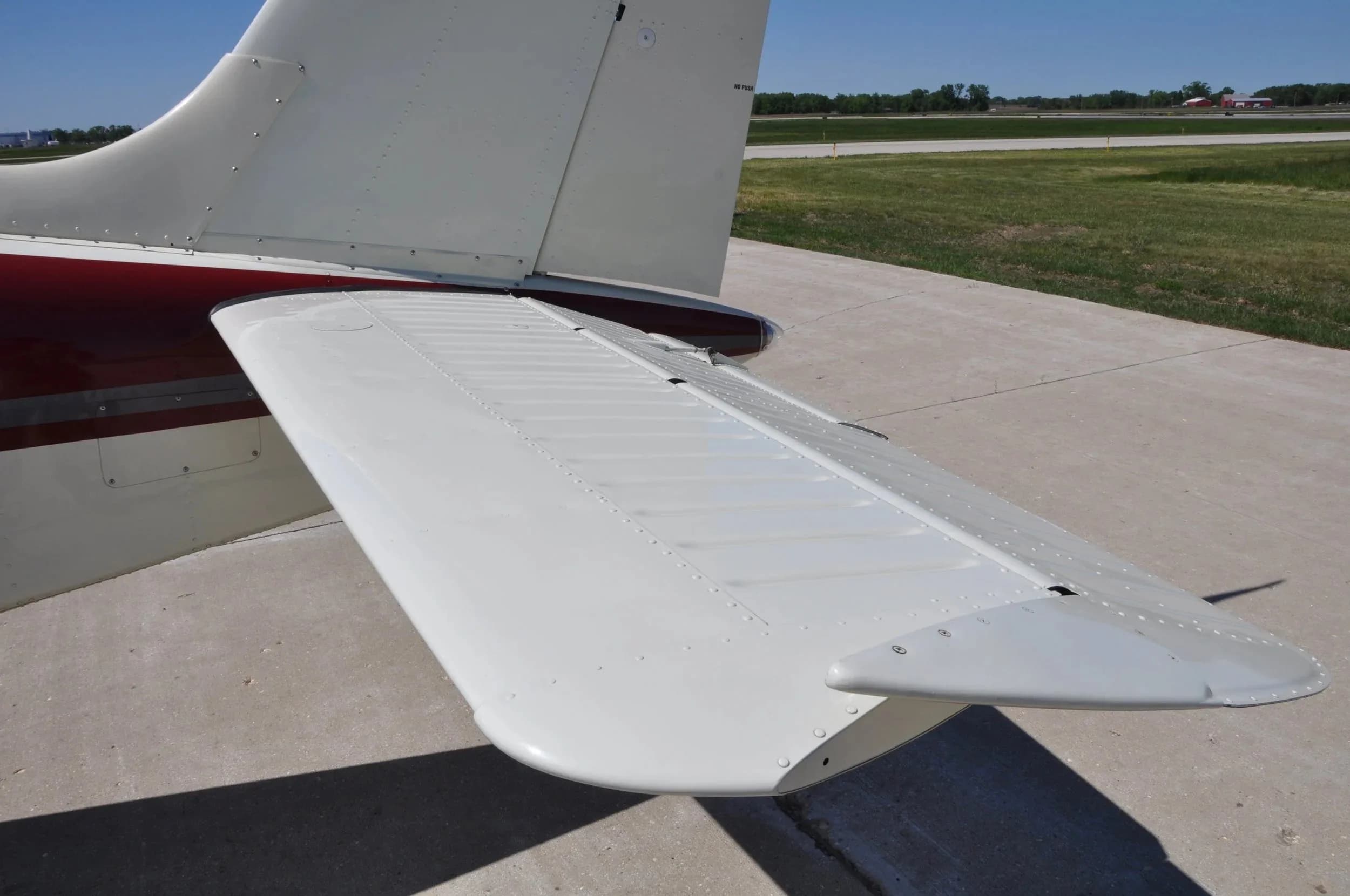A close-up view of the right horizontal stabilizer and elevator of the Beechcraft Bonanza F33A N159GM.