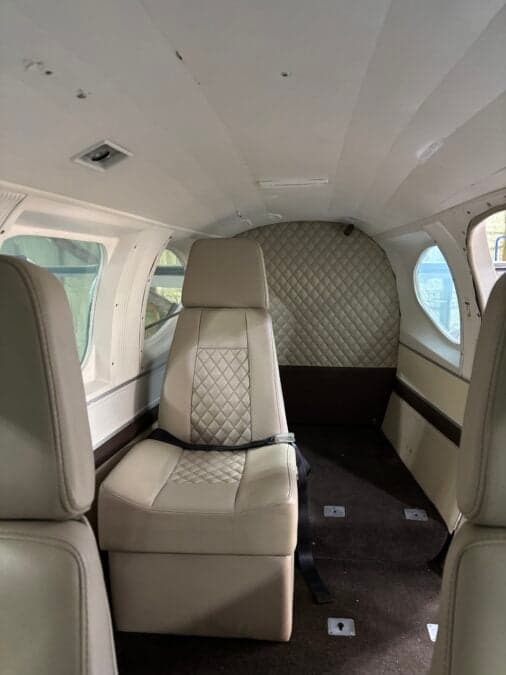 View of the interior cabin with a single seat.
