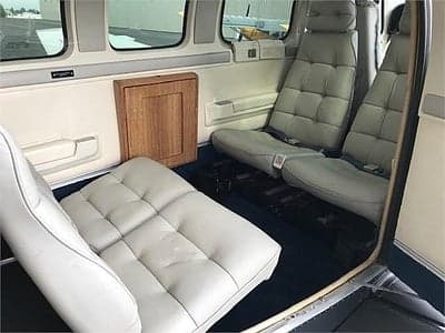 Interior of the aircraft showing the rear passenger seats.
