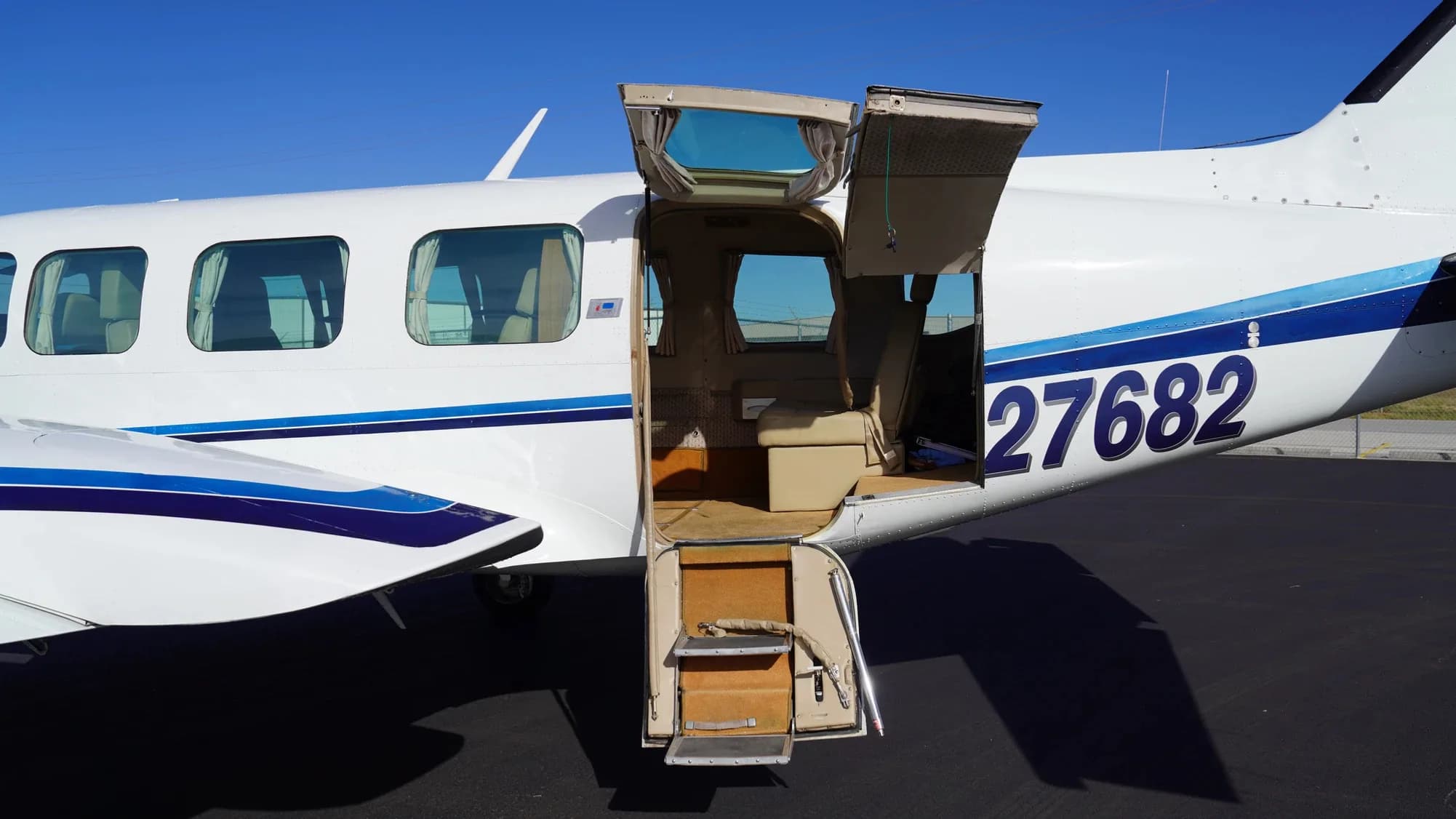 View of the aircraft's open door and interior steps.