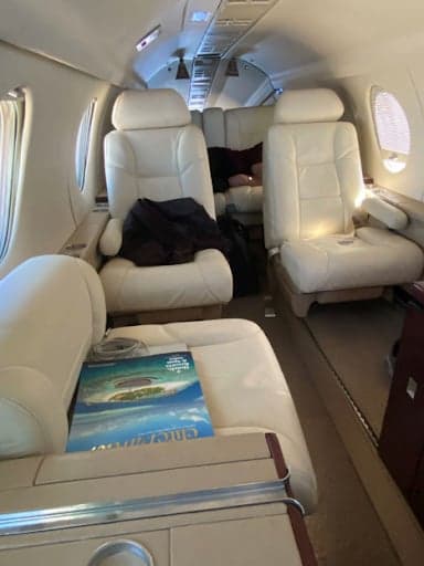 View of the aircraft cabin with leather seats.