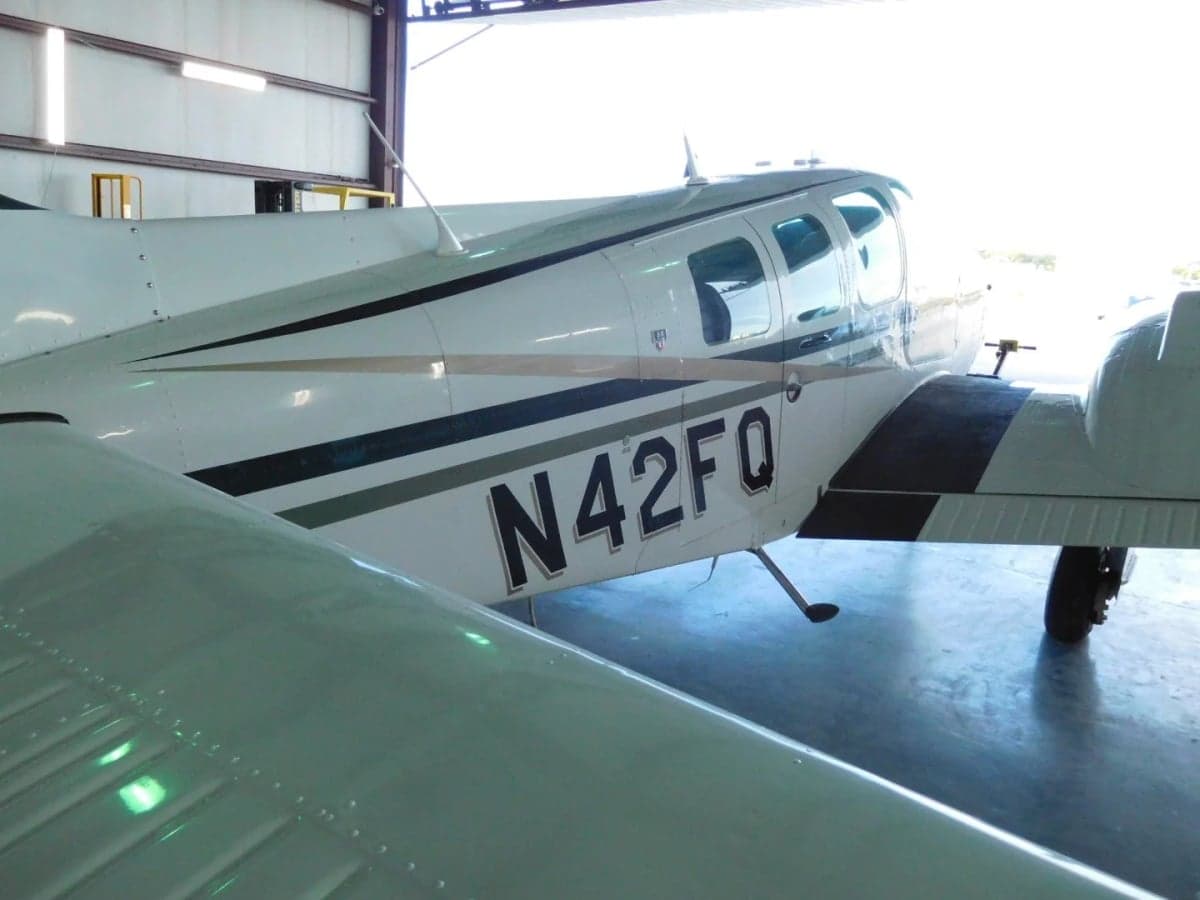 Close-up of the fuselage of the Beechcraft Baron N42FQ.