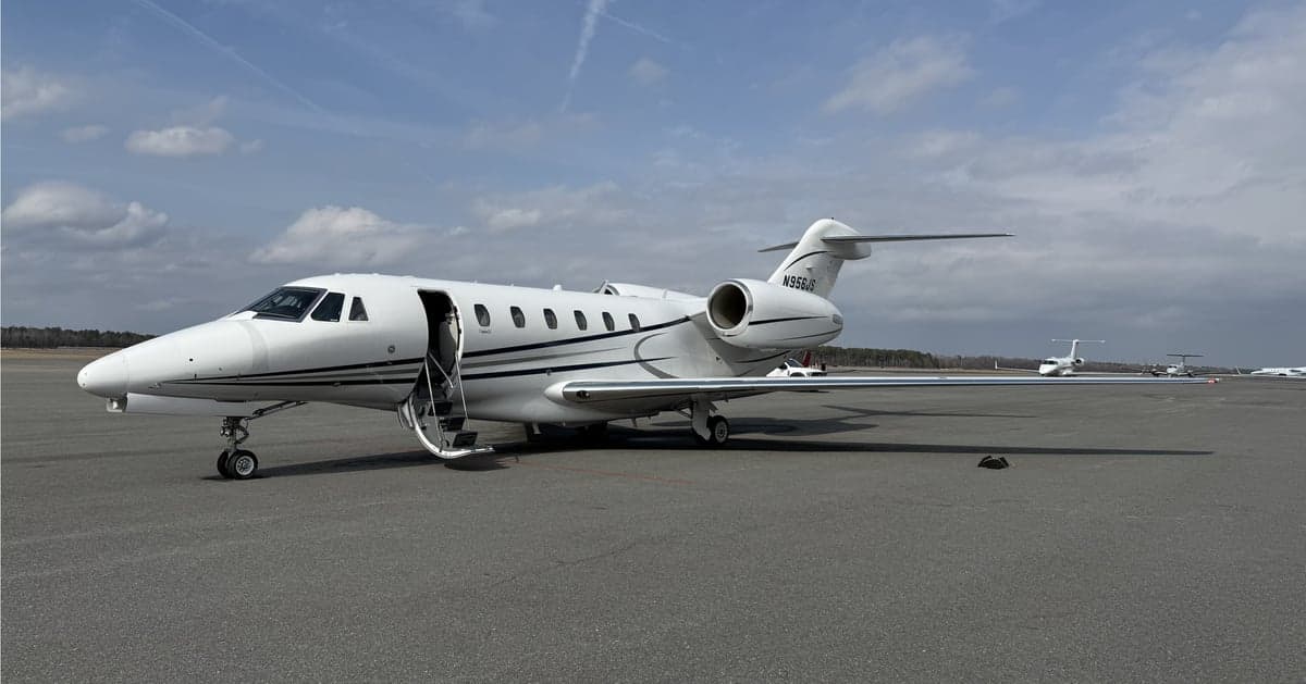 Citation jet with white paint scheme on the tarmac.