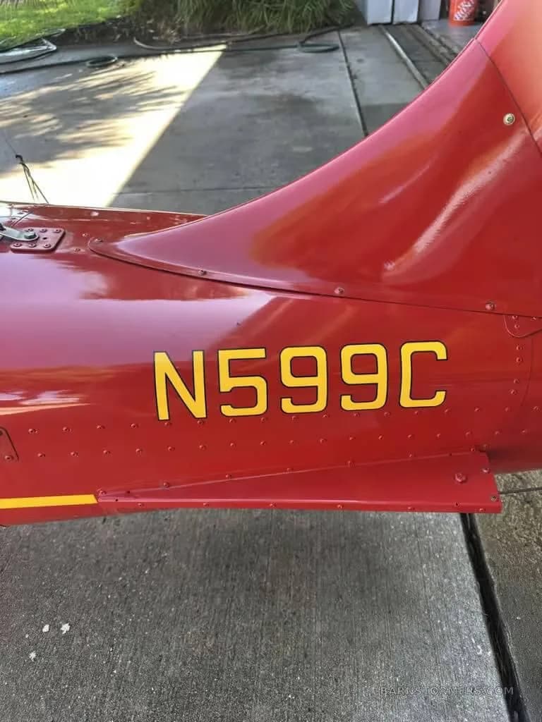 Close up of the tail of the aircraft showing the tail number N599C.