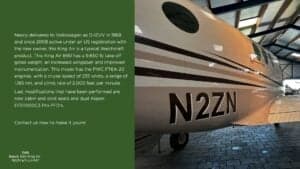 The tail of a Beech B90 King Air aircraft with the registration number N2ZN is visible.