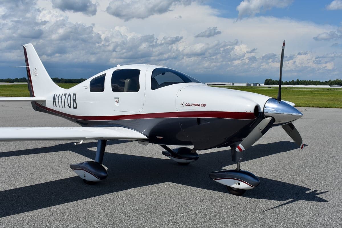 Front view of the Columbia 350 aircraft on the tarmac.