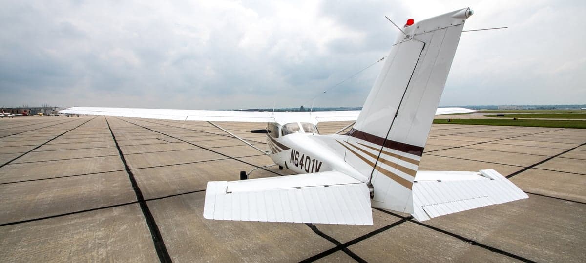Front view of the N6401V Cessna aircraft on the tarmac.