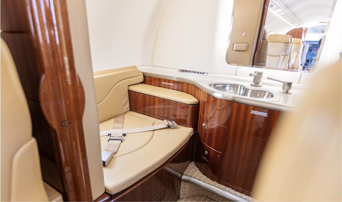 The lavatory area inside the aircraft cabin.