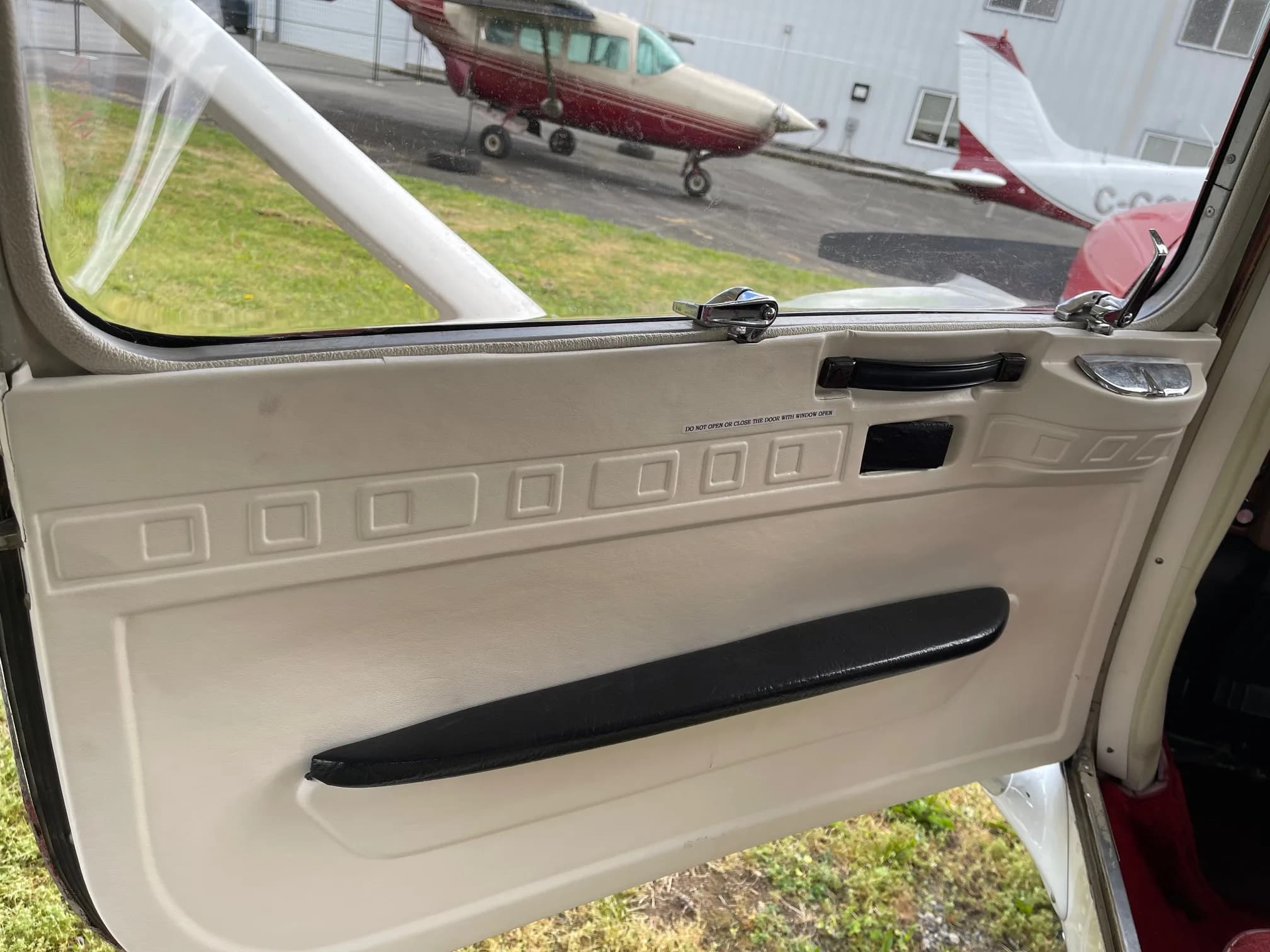 Interior view of the aircraft door panel.