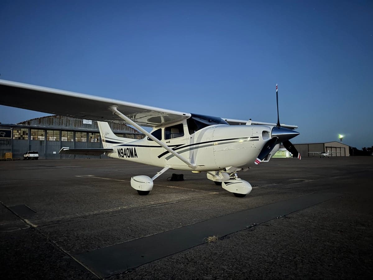 N940MA Cessna Skylane parked on the tarmac at night.