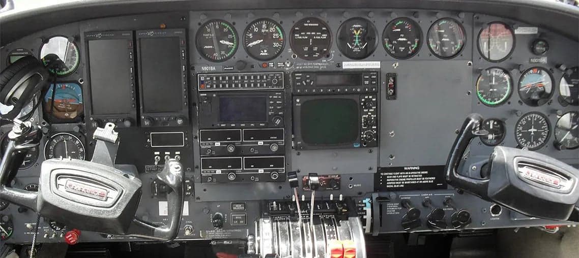 The cockpit of the aircraft N901BA, showing the instrument panel and controls.
