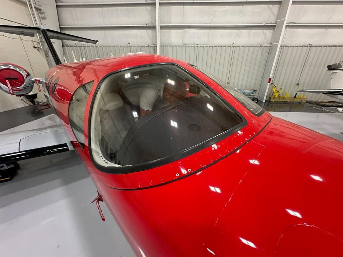 View of the aircraft's cockpit and front windows.